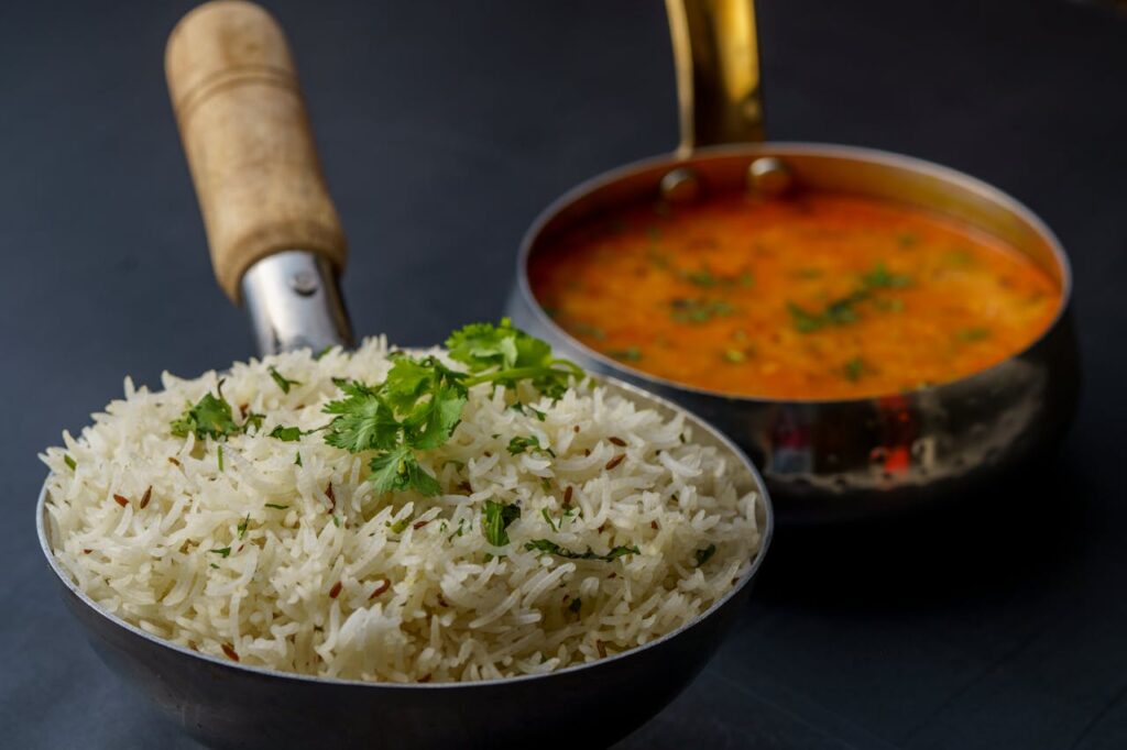 Nizams Delicious Kitchen Indian Dal and Rice in Traditional Utensils